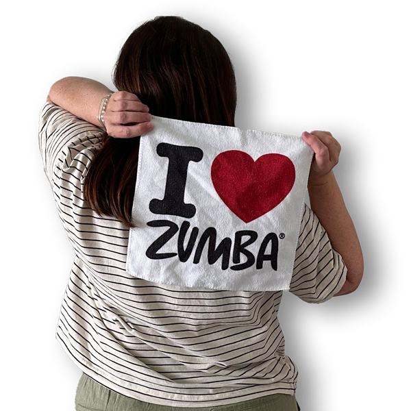 Picture of the back of Rachel holding a zumba sign