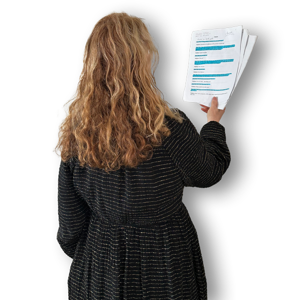 Picture of the back of Angela holding a play script