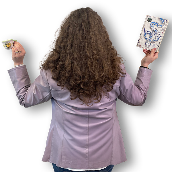 Picture of the back of Angela holding an espresso cup
