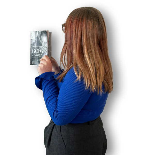 Picture of the back of Joey holding a book