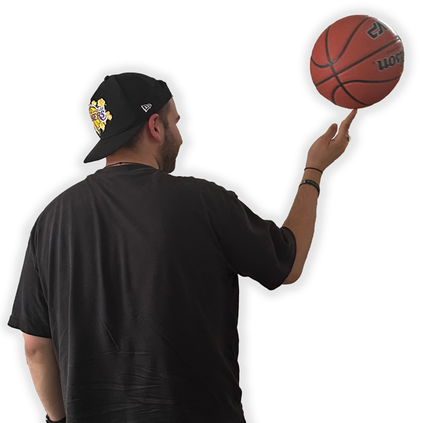Picture of the back of Mo holding a basket ball