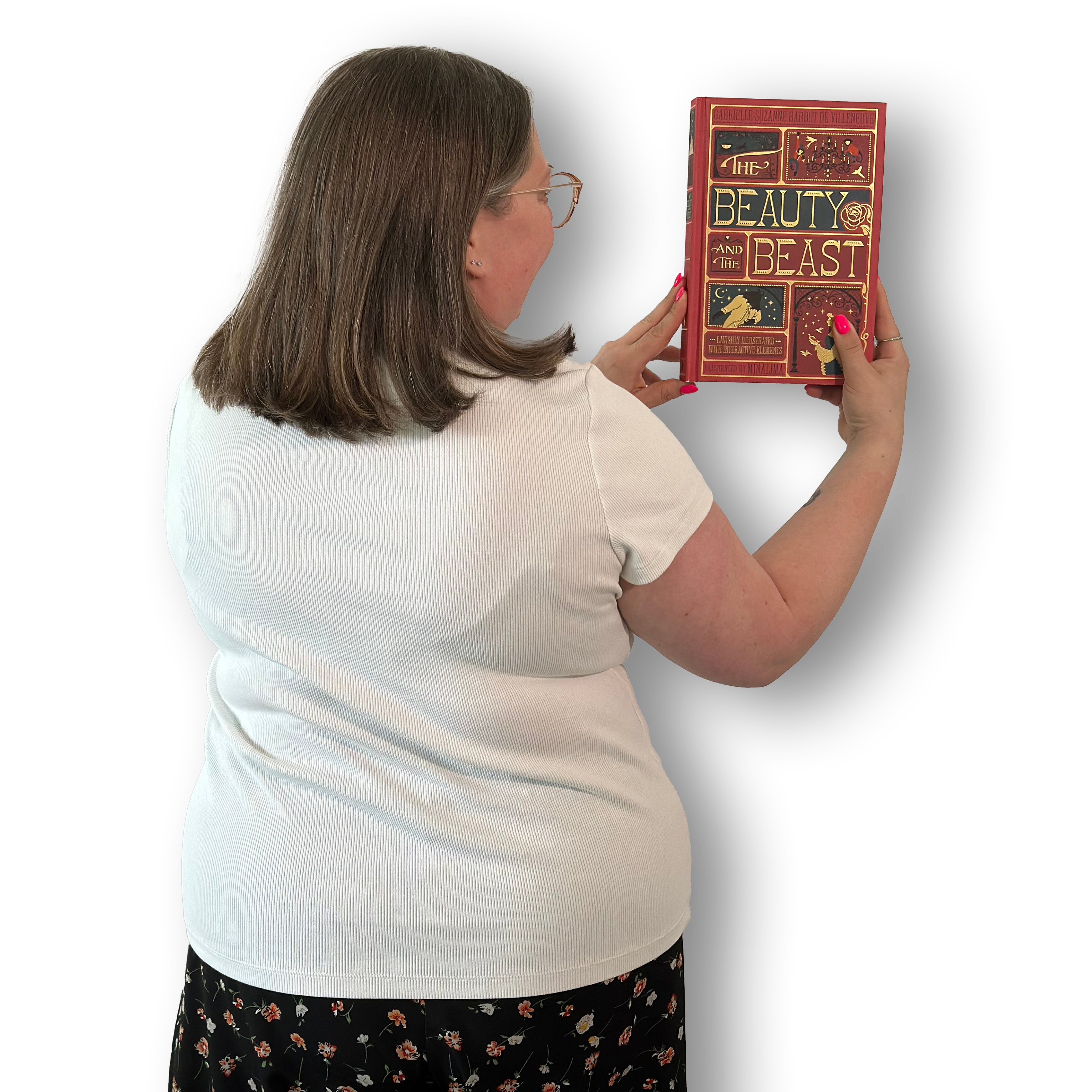 Picture of the back of Laura holding a book