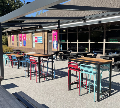 Outside Student Union showing tables and chairs