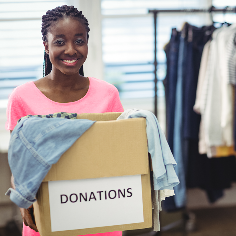 Reloved Donations - hand receiving gift